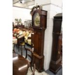 Barber of Winster, a mahogany and oak cased long case clock with arched dial.