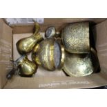 Eastern embossed brass jardinieres and other items.