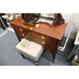 A small mahogany sideboard / table.