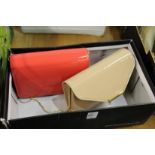 A LK Bennett patent leather clutch bag and a Hobbs coral coloured clutch bag.