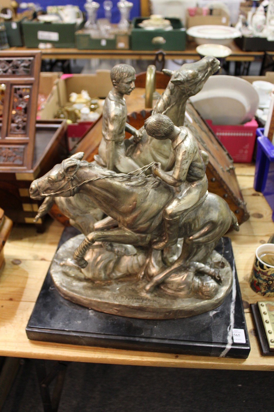 After Frederick Remington, Polo, a good cast metal group on a marble base.