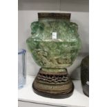 An unusual large Chinese carved jadeite vase on stand (converted to a lamp).