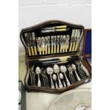 An oak cased canteen of cutlery.