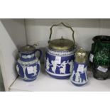 A Jasper ware biscuit barrel, jug and sugar sifter.