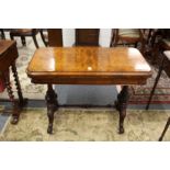 A good Victorian figured walnut rounded rectangular foldover card table.