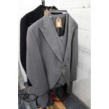 Moss Bros grey morning suit with top hat together with a dinner suit.