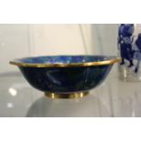 A Chinese blue ground cloisonne wavy edged bowl.