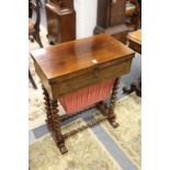 A 19th century rosewood work table with foldover rectangular top, single frieze drawer, a pull-out