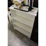 A small painted bookcase.