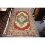 A Persian design carpet.