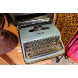 An Olivetti Lettera 22 portable typewriter.