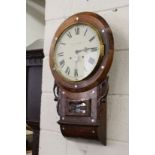 A rosewood cased drop dial wall clock.