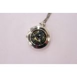 A silver Masonic locket and chain.
