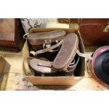 A group of four binoculars to include an early Carl Zeiss pair, all with leather cases.