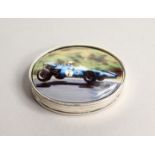 AN OVAL SILVER RACING CAR PILL BOX