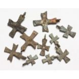 TEN SMALL ROMAN IRON CROSSES 1.5ins long