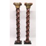 A VERY GOOD PAIR OF 18TH CENTURY CARVED SPIRAL MAHOGANY COLUMNS with carved gilded corinthian column