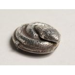 A SILVER SNAKE VESTA