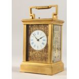 A GOOD 9TH CENTURY BRASS REPEATER CARRIAGE CLOCK by Bright & Son, Paris with blue and white dial and