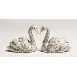 A PAIR OF .925 SILVER PLATED SWAN SALT AND PEPPERS