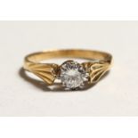 AN 18CT GOLD DIAMOND SOLITAIRE RING