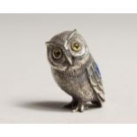 A NOVELTY SILVER OWL PIN CUSHION.