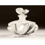 A LALIQUE GLASS SCENT BOTTLE with stopper, engraved Lalique, France. 3ins high