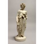 A 19TH CENTURY PARIAN FIGURE DEPICTING HARVEST 23ins high