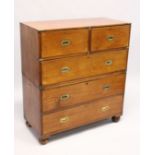A GOOD 19TH CENTURY TWO PIECE MILITARY CHEST with two short and three long graduated drawers with