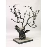A LARGE AND UNUSUAL CAST BRONZE SCULPTURE, modelled as a deer's head with floral antlers. Approx.4ft