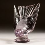 A LALIQUE GLASS "HIRONDELLE" CAR MASCOT, on a circular base. Lalique, France 5.5ins high.