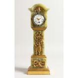 A SUPERB 19TH CENTURY ONYX MINIATURE LONGCASE CLOCK, the white dial with painted garlands, the