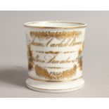 A MUG, inscribed James Carlise Brown, born December 5th, 1850.