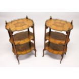 A PAIR OF EARLY 20TH CENTURY FRENCH MARQUETRY AND ORMOLU MOUNTED THREE TIER ETAGERES, with galleried