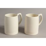 A PAIR OF KEITH MURRAY WEDGWOOD TANKARDS 4.5ins high.