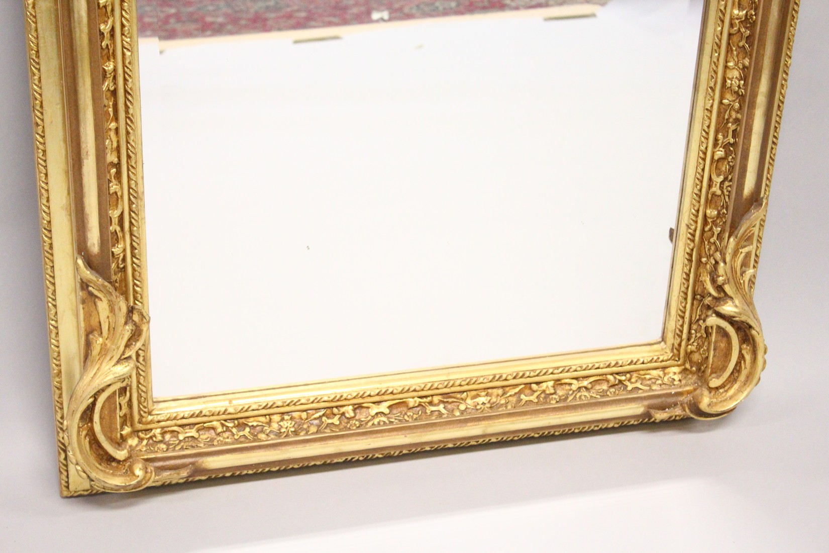 A LARGE ORNATE GILT FRAMED ARCH TOP MIRROR, the top with moulded leafwork decoration. 5ft high x 2ft - Image 4 of 5