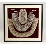 THREE PIECES OF FINE WHITE LACE COLLARS, framed and glazed 20ins x 20ins.