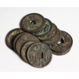 ELEVEN CHINESE BRONZE COINS