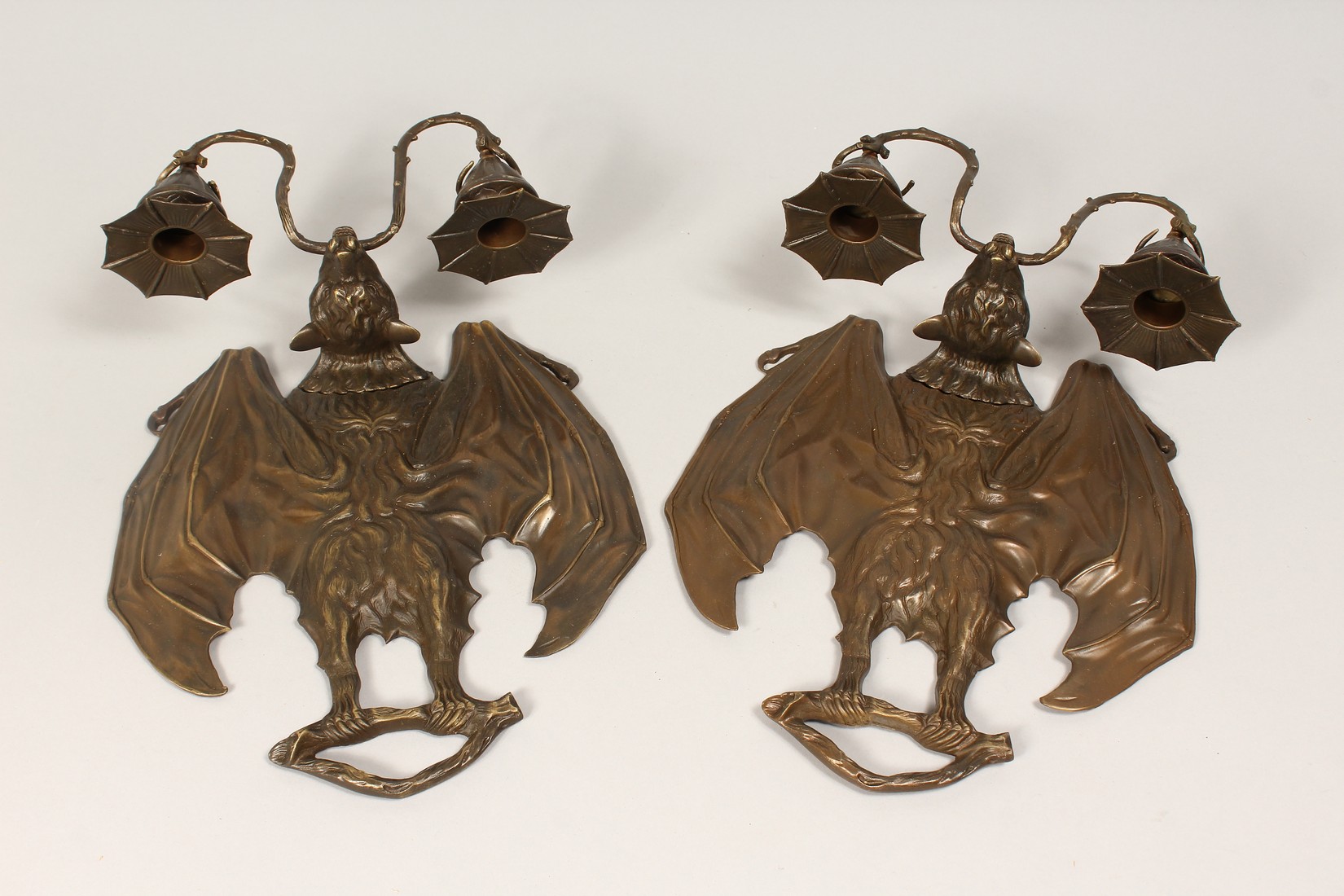 AN UNUSUAL PAIR OF CAST BRONZE BAT SHAPED TWIN LIGHT WALL SCONSES. - Image 2 of 3