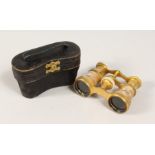 A PAIR OF LATE 19TH CENTURY OPERA GLASSES BY LEMAIRE, PARIS, the gilt body decorated with figures,