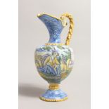 A GOOD MAJOLICA EWER with a classical scene 12ins high.