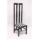 AN UNUSUAL BLACK LACQUER, OVERSIZED HIGHBACK CHAIR, in the manner of Charles Rennie \Mackintosh. 5ft