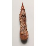 A CARVED WOOD INSECT FLASK