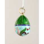 A GOOD RUSSIAN SILVER AND ENAMEL EGG PENDANT