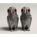 A PAIR OF .800 SILVER PLATED OWL SALT AND PAPPERS