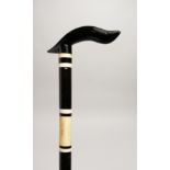 A BLACK AND WHITE WALKING STICK 36ins long