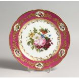 A 19TH CENTURY FRENCH DENVELLE PORCELAIN PLATE with rose coloured border, vignettes of flowers, gilt