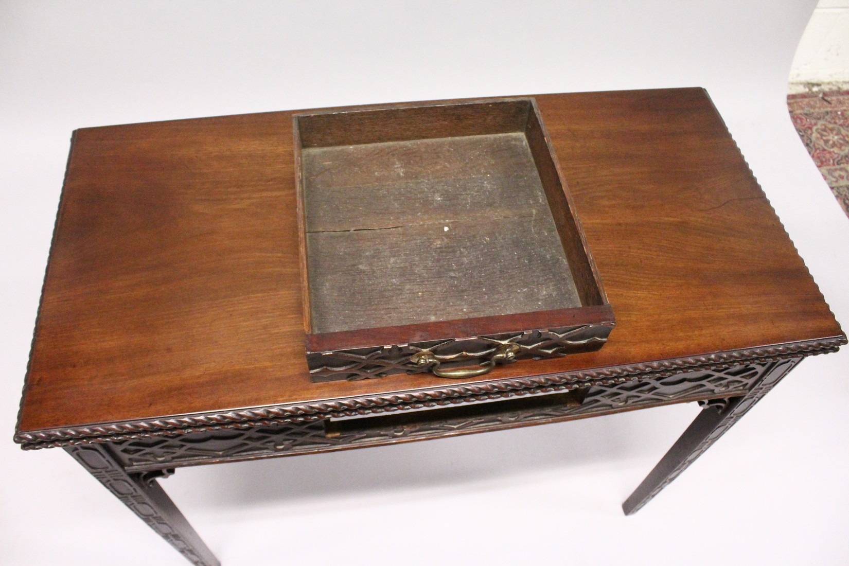 A GOOD GEORGE III MAHOGANY RECTANGULAR FOLDING TOP TEA TABLE with blind fret, curving and single - Image 5 of 7