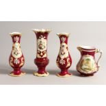 A GARNITURE OF THREE FLORAL VASES AND A JUG (4)