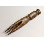 A CARVED WOOD TRIBAL FORK 7.5ins long